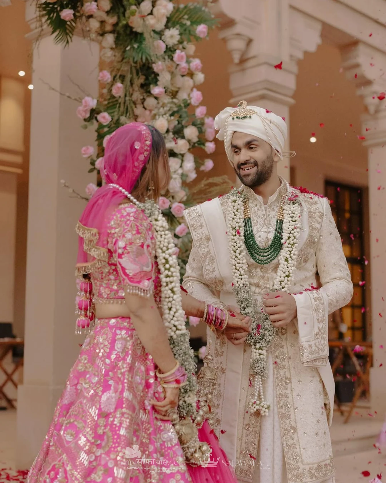 wedding safa wala in Ampitiya – Close detail of a red wedding safa with an emerald kalgi
